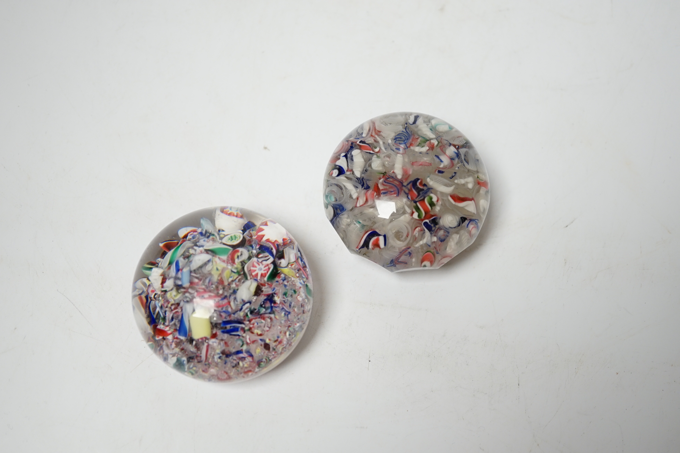 Two French ‘scrambled’ glass paperweights, 6cm diameter